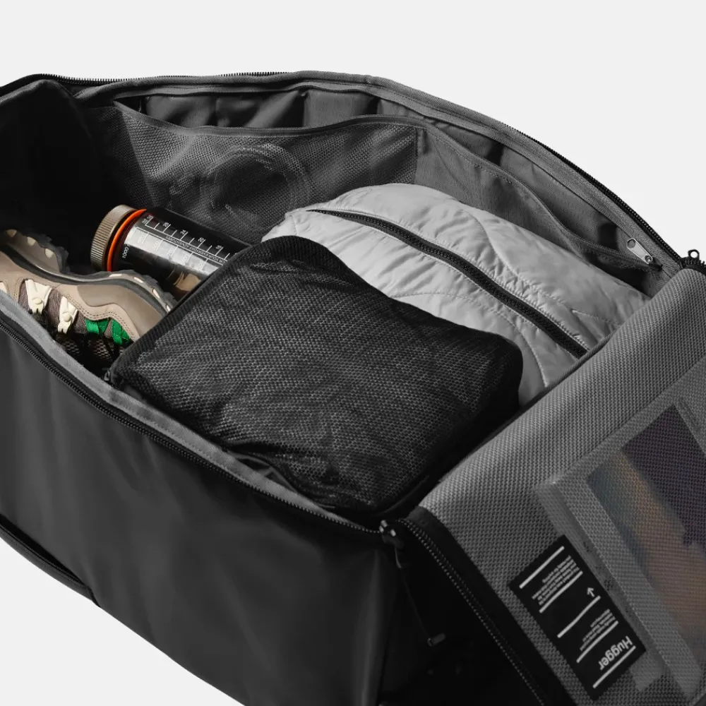 Reistassen Op Wielen^Db Journey Hugger Check-in reistas op wielen 60L black out